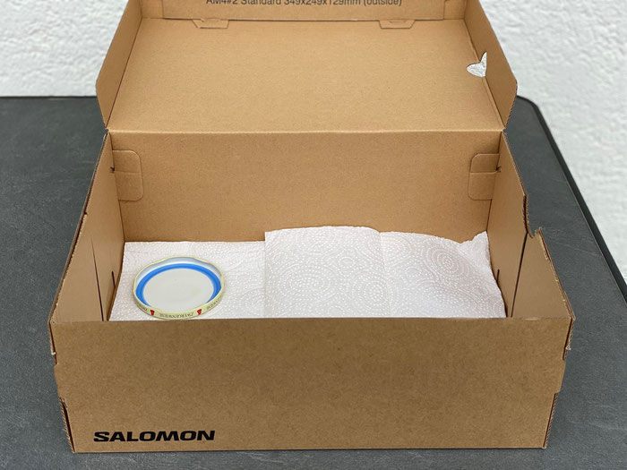 Geschirrtuch zerknüllen